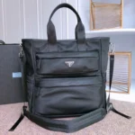 PRADA TOTE BAG 38 IN BLACK RE-NYLON AND SAFFIANO LEATHER TRIM