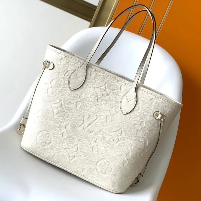 20210718_i1626582423_1708_0_jpg_55a270d4-d59f-480c-b193-365cea462f03 LV NEVERFULL MM WHITE MONOGRAM EMPREINTE LEATHER - Image 1