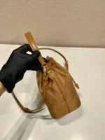 PRADA BUCKET BAG 19 IN RUSSET BROWN RE-NYLON AND CALFSKIN HANDLE - Image 3