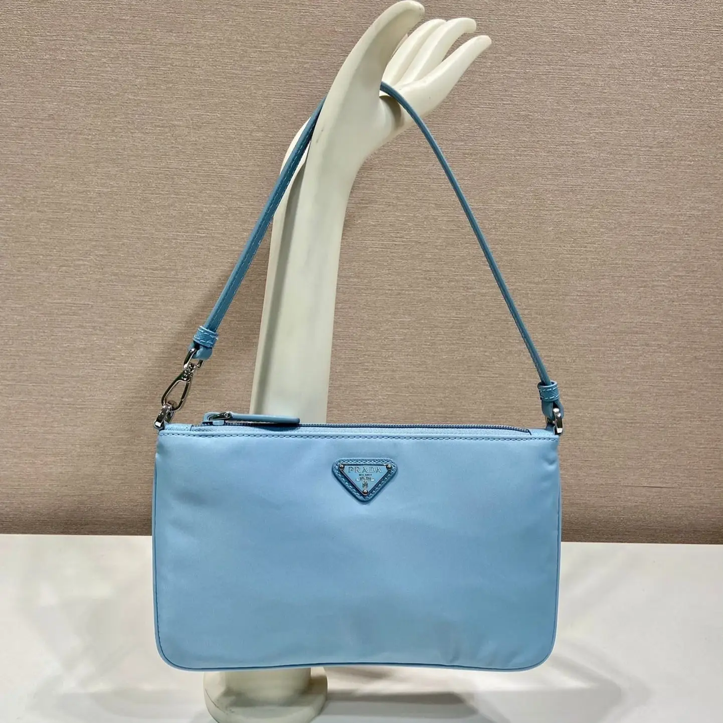 PRADA SHOULDER BAG 24 WITH TRIANGLE LOGO IN SKY BLUE RE-NYLON FABRIC