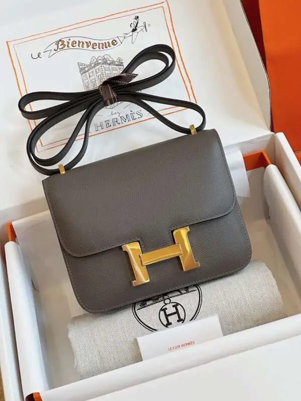 Tui-Hermes-Constance-Bag-Epsom-Gold-Mau-Xam-Sieu-Cap-19cm-2-600x800-1 Hermes Constance Bag Epsom Gold Grey With Lock Gold Handbags 19cm - Image 1