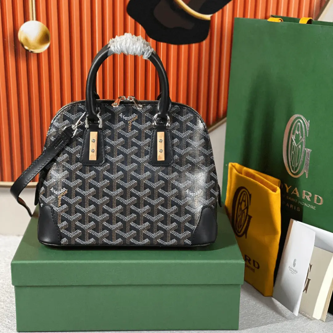 Untitled-design-2025-05-23T191311.023 Goyard Alma Vedome Black Replica Handbag With Fabric Wrapped Leather Strap 24cm - Image 1