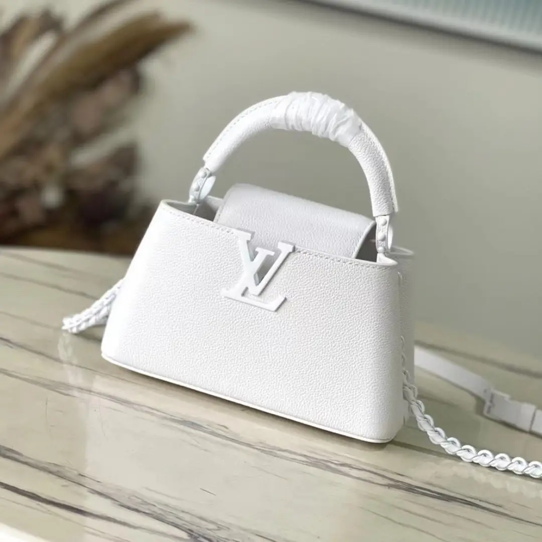 Untitled-design-2025-05-27T082158.229 Louis Vuitton LV Capucines Handbags White Leather 21cm - Image 1