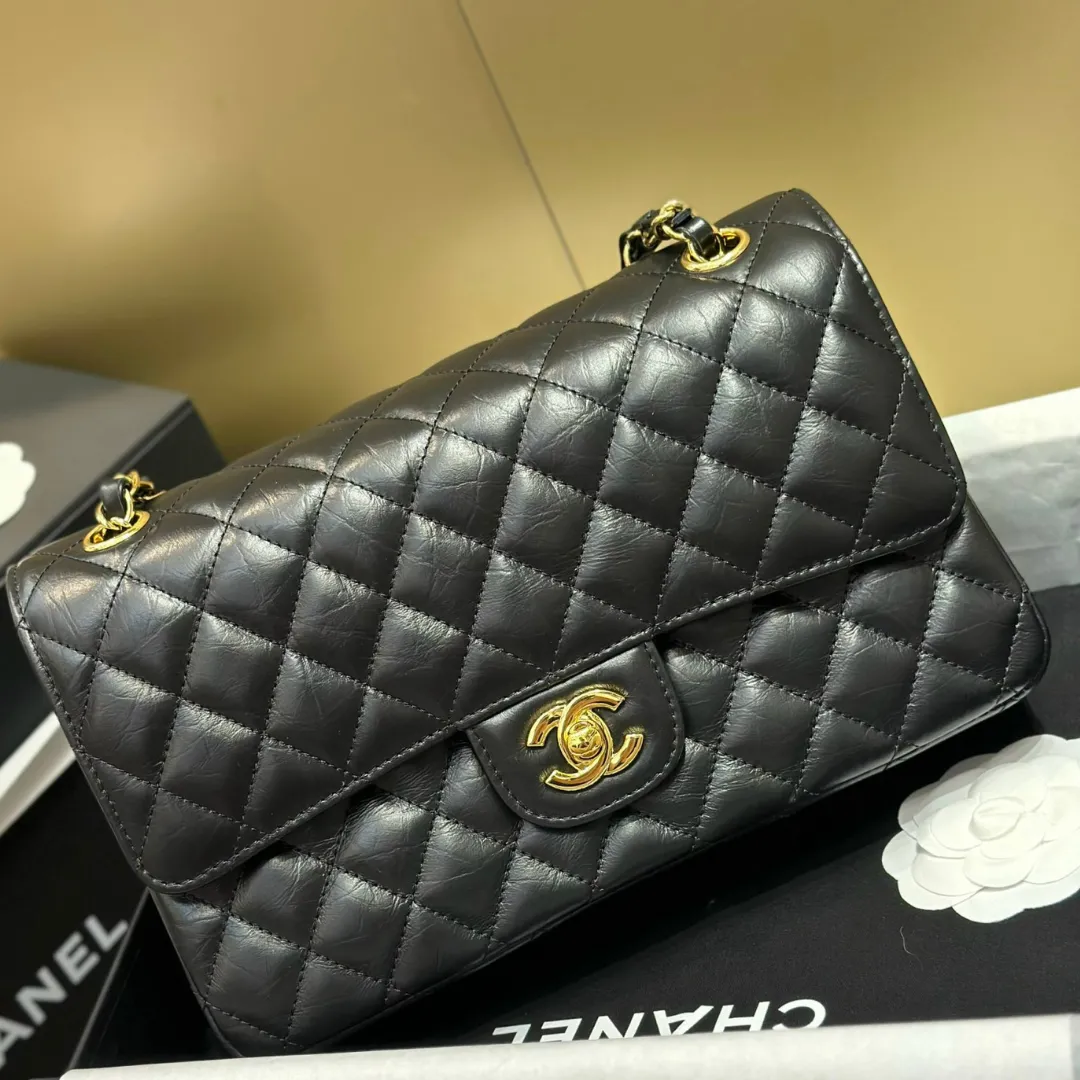 Untitled-design-2025-05-29T025032.880 Chanel Classic Lock Gold With Black Wrinkled Skin Like Auth Handbags 25cm - Image 1