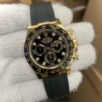 Rolex Daytona Black Dial with Diamond Markers and Gold Bezel - Image 2