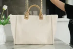 CHANEL TOTE BAG 39 ATTACHED PEARL LOGO IN BEIGE CANVAS GOLD HARDWARE - Image 4