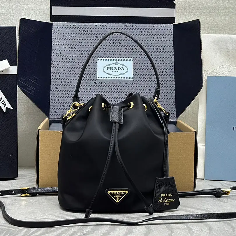 PRADA BUCKET BAG 19 IN BLACK RE-NYLON AND CALFSKIN HANDLE